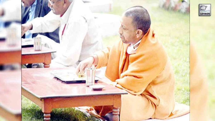 Yogi Eats Prashad Under Amla Tree