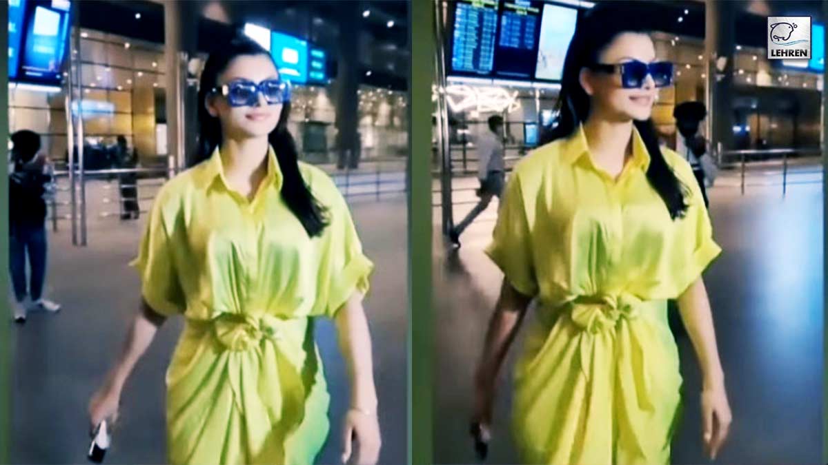 urvashi-rautela-spotted-at-airport-wore-neon-color-bold-outfit