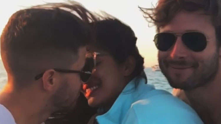 Nick Jonas & Priyanka Chopra Get Interrupted During Romantic Moment By Glen Powell!