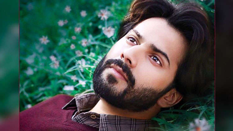 October first look: Varun Dhawan is lost in thoughts as he lays in the meadows