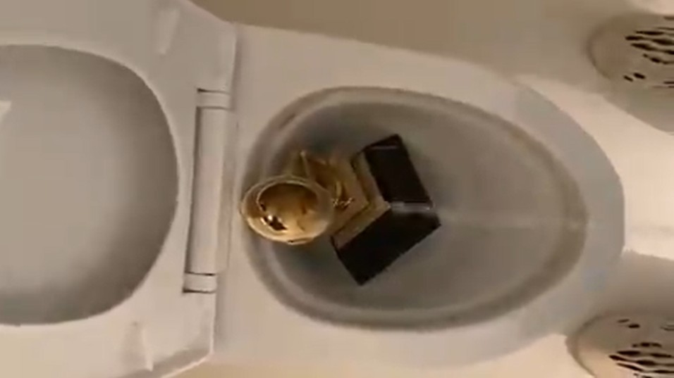 Kanye West Tweets A Video Of Grammy Award In A ‘Commode’