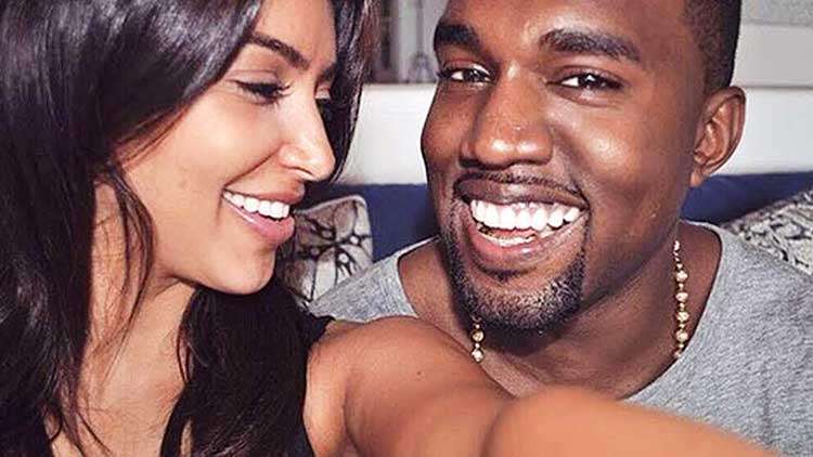 PDA Alert: Kim Kardashian Kisses Kanye West During SKIMS Promotions