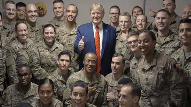 Trump makes surprise visit to Afghanistan, eats Turkey with soldiers