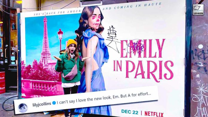 Emily In Paris Star Lily Collins Poses In Front Of Vandalized Poster