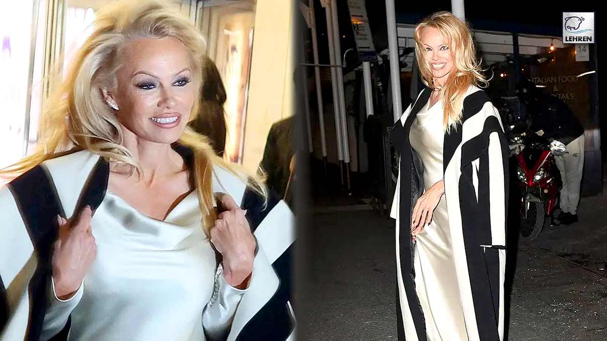 pamela anderson flaunts her silk white gown