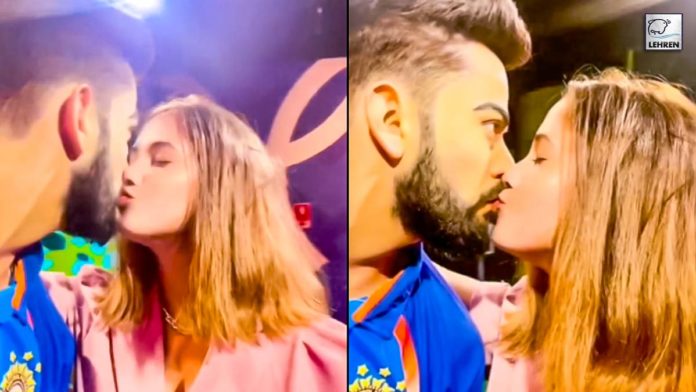 virat kohli gets lip kiss from female fan