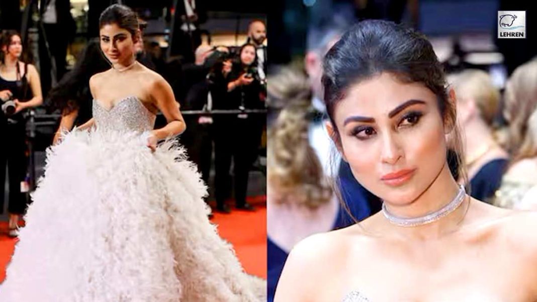 mouni roy walks the cannes red carpet in a feathery gown