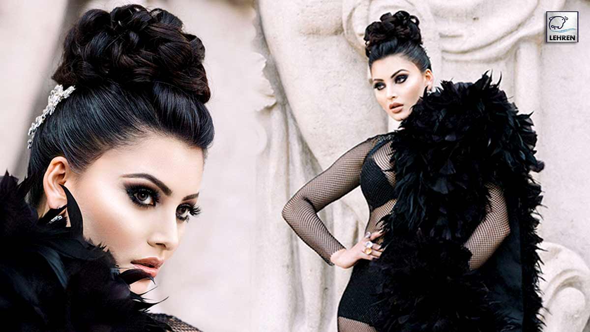 urvashi rautela flaunts busty figure in black netted outfit